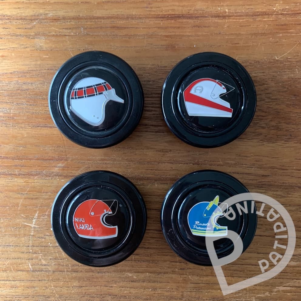 Ickx, Regazzoni, Lauda, Stewart - Helmet Horn Buttons