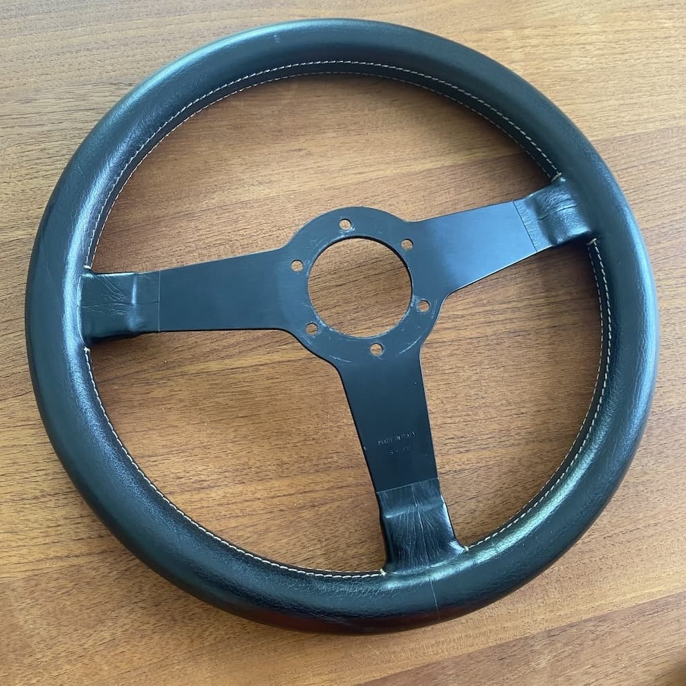 vintage black Momo Jacky Ickx steering wheel for sale, mint