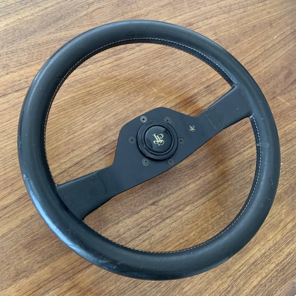 Momo JPS John Player Special Steering Wheel – Side Momo JPS John Player Special Steering Wheel - Side