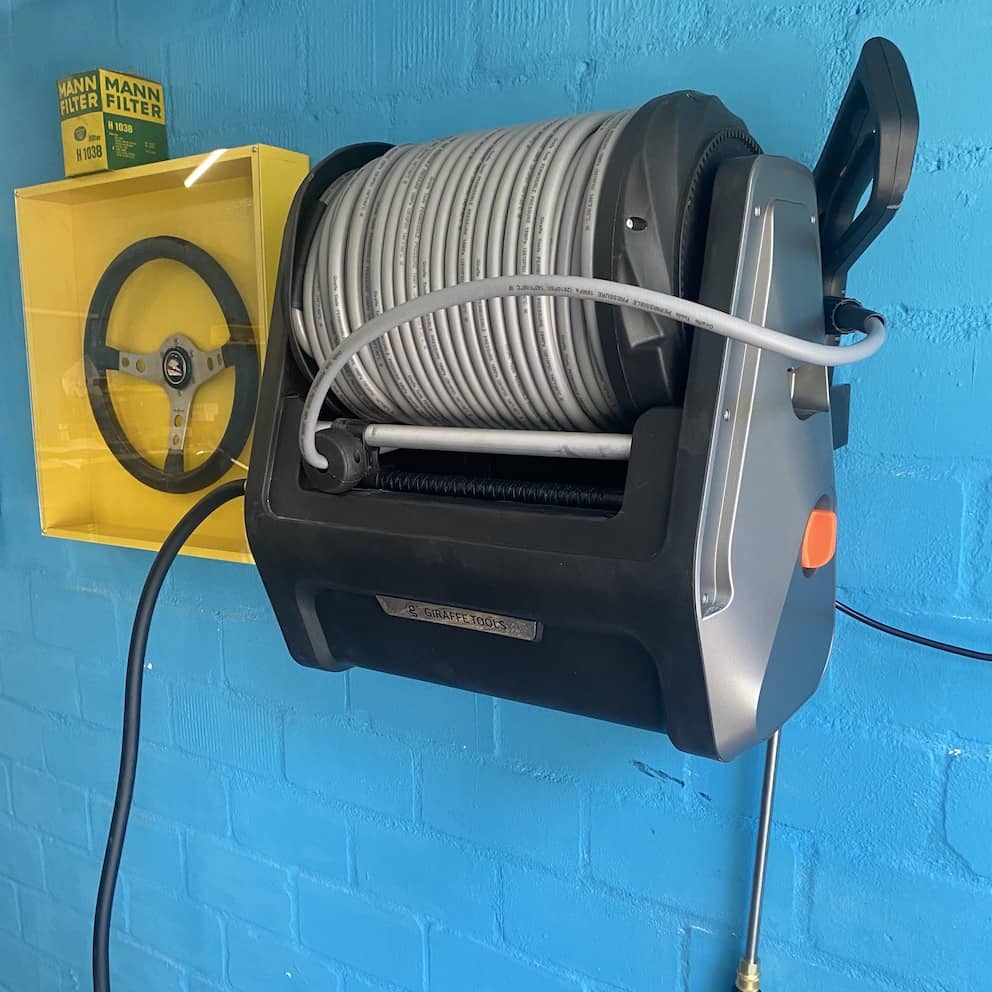 Wall-Mounted Giraffe Tools Pressure Washer with Retractable Hose Wall-Mounted Giraffe Tools Pressure Washer with Retractable Hose
