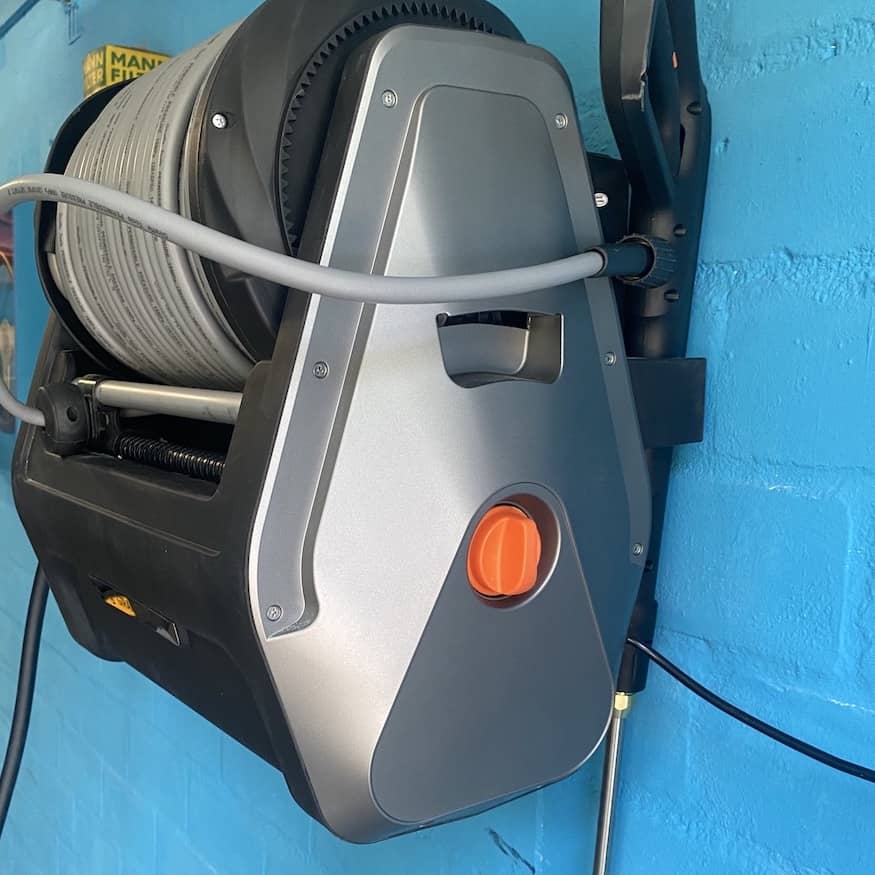 On/Off Switch of the Wall-Mounted Giraffe Tools Pressure Washer with Retractable Hose On/Off Switch of the Wall-Mounted Giraffe Tools Pressure Washer with Retractable Hose