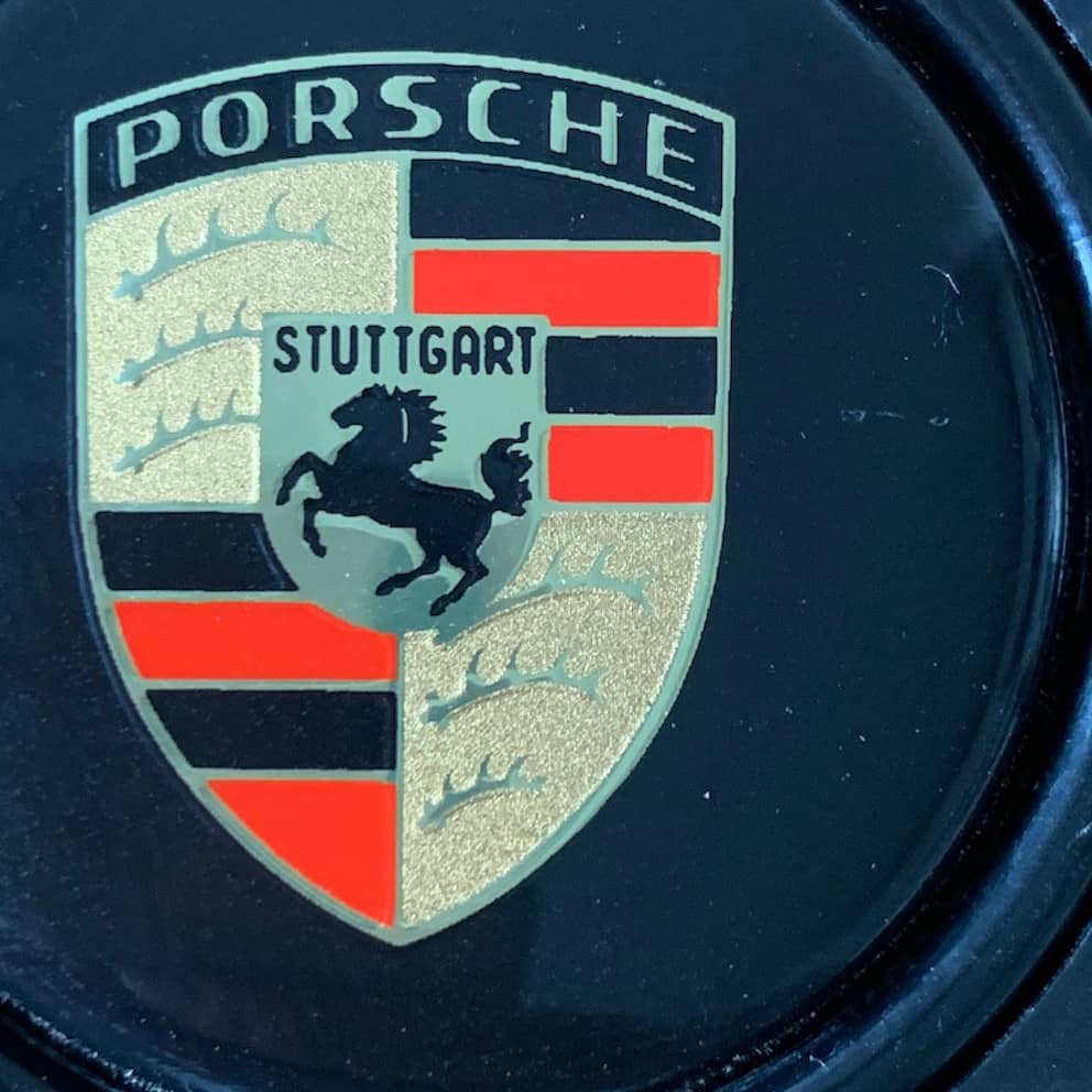 Fake or legit Momo Porsche horn button? Fake or legit Momo Porsche horn button?