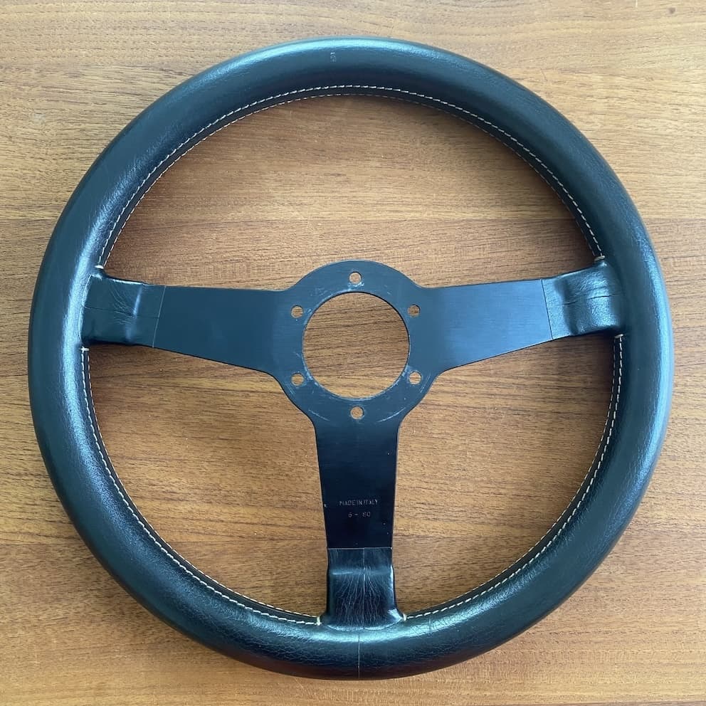 vintage black Momo Jacky Ickx steering wheel for sale, mint