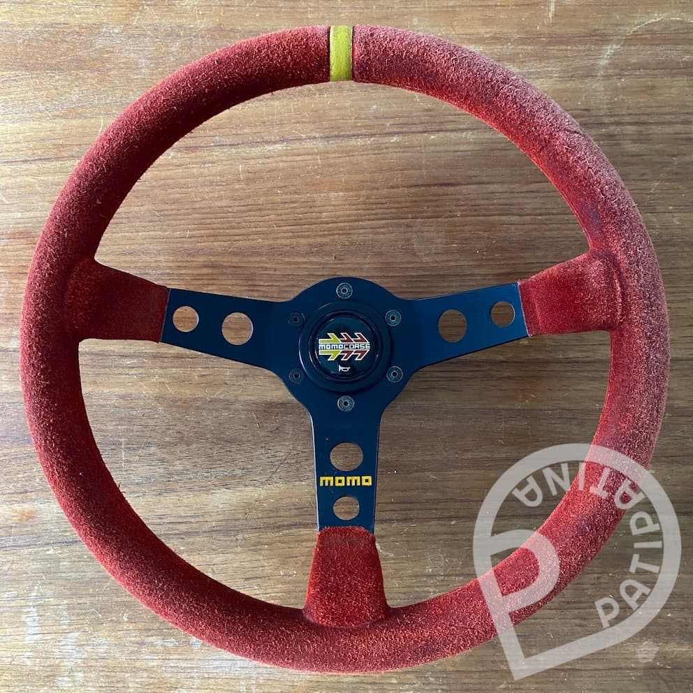 Red suede Momo Mod07 steering wheel